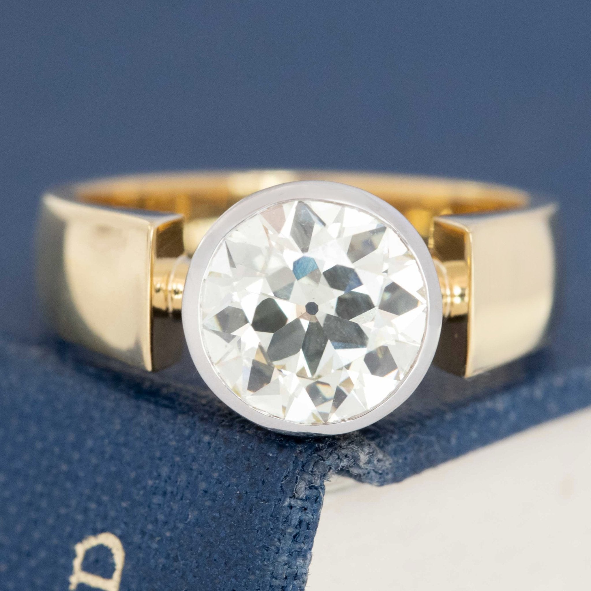 Vintage diamond bezel ring showing old European cut facets