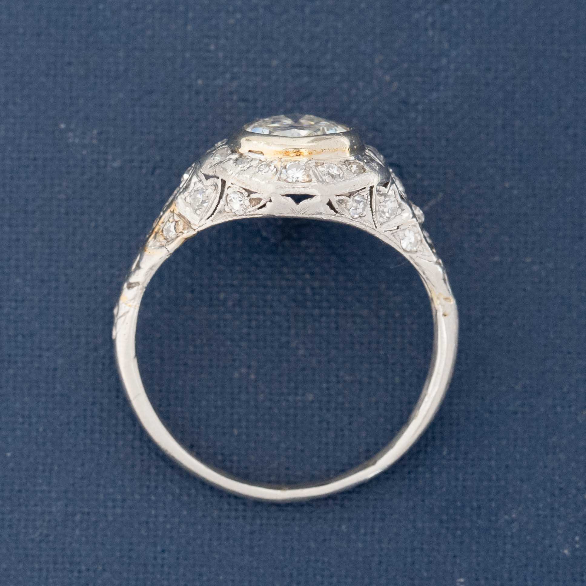 Platinum vintage ring with pear-shaped center diamond