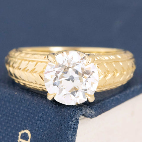 2.07ct GIA L SI1 old European cut diamond in a chunky fluted engraved solitaire, 18K yellow gold
