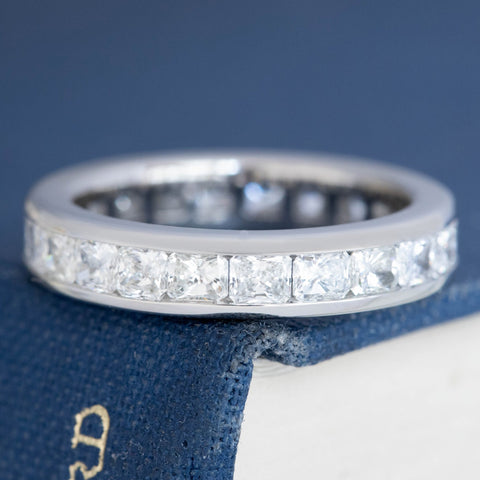 2.28ctw east-west radiant cut diamond channel set eternity band in platinum