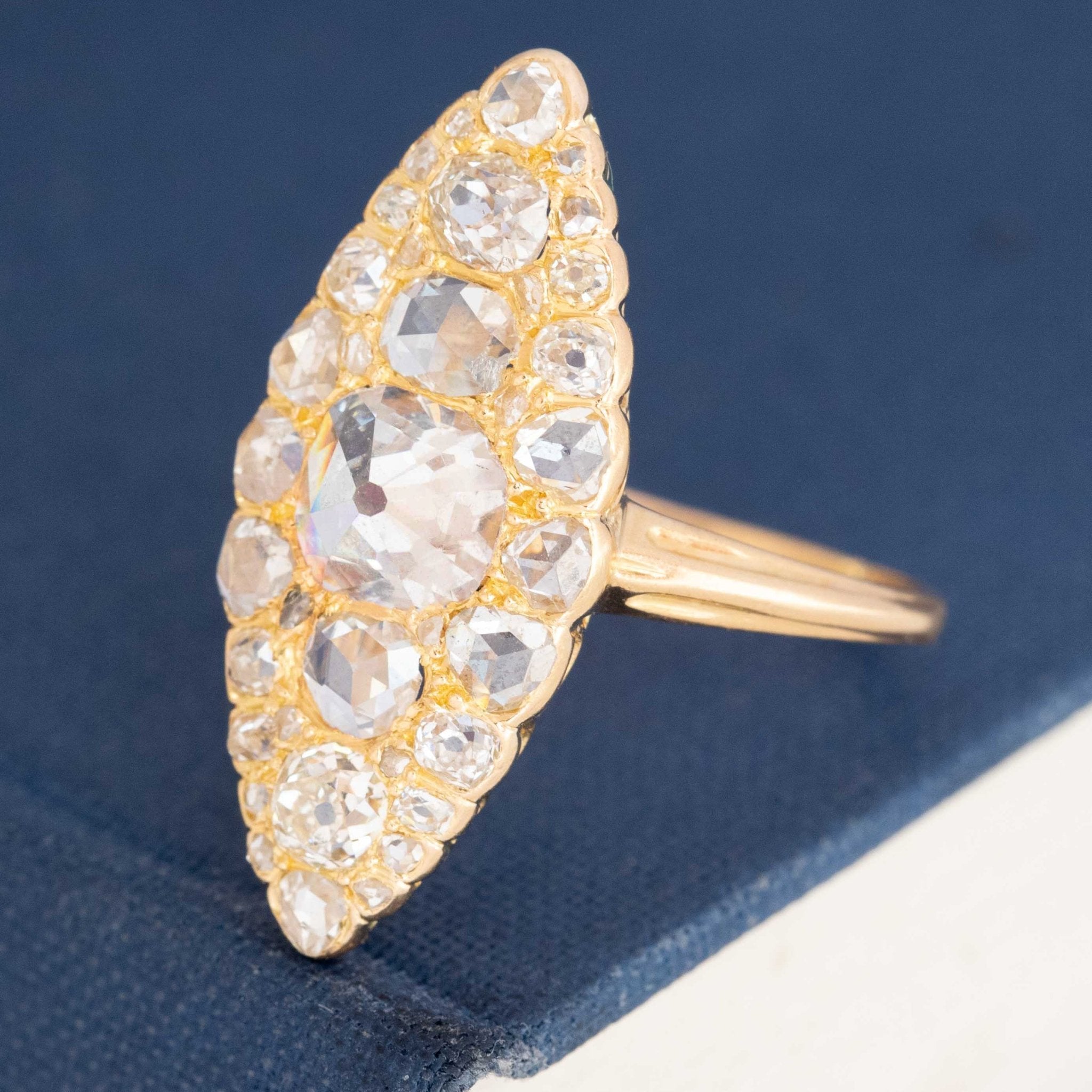 Chunky navette ring in yellow gold with old mine and rose cut diamonds.
