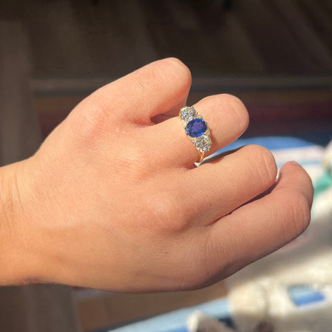 2.62ctw oval blue sapphire and old European cut diamond trilogy ring, 18K yellow gold – alternate view 2