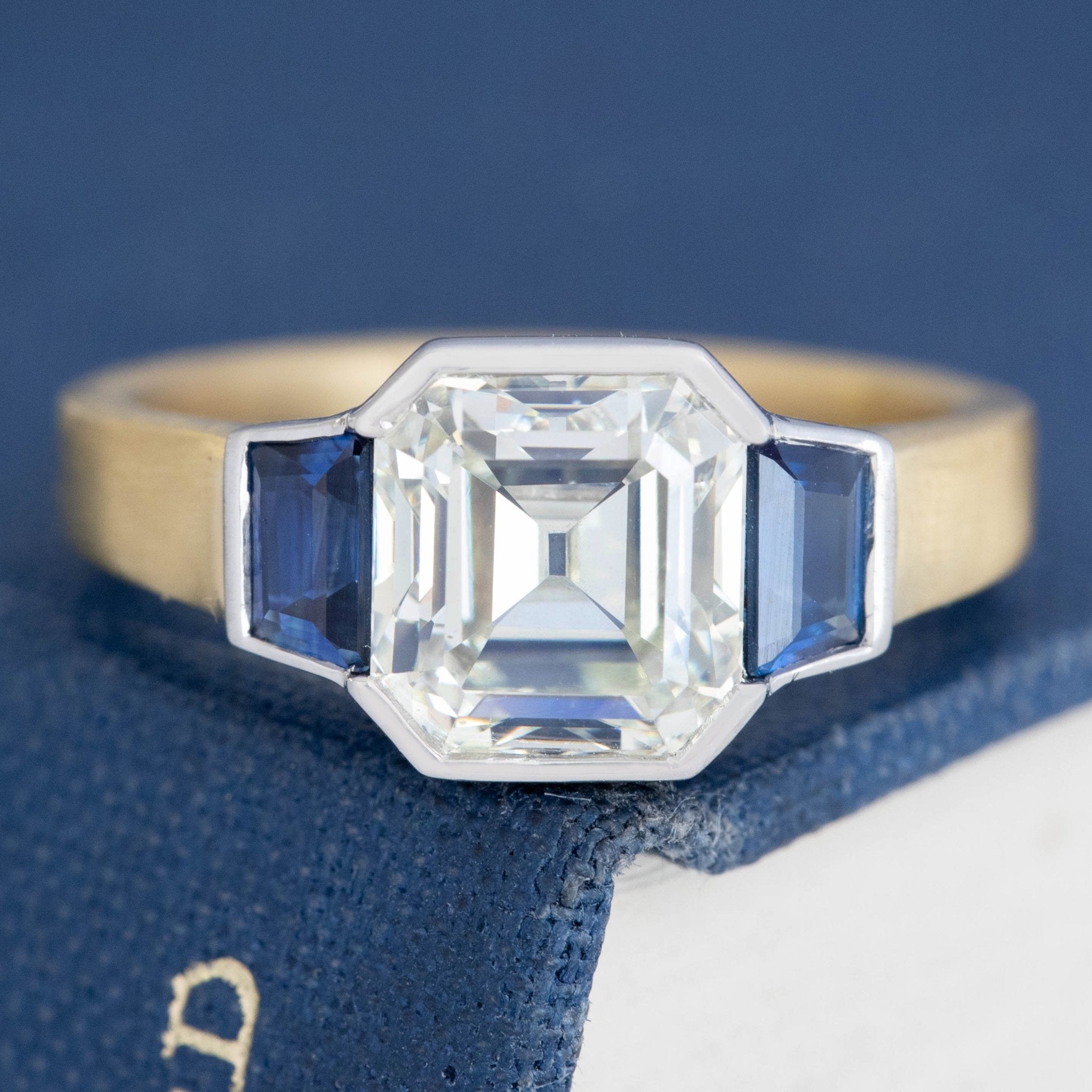 2.66ct Asscher Cut Diamond & Sapphire Trilogy Ring, GIA M SI2