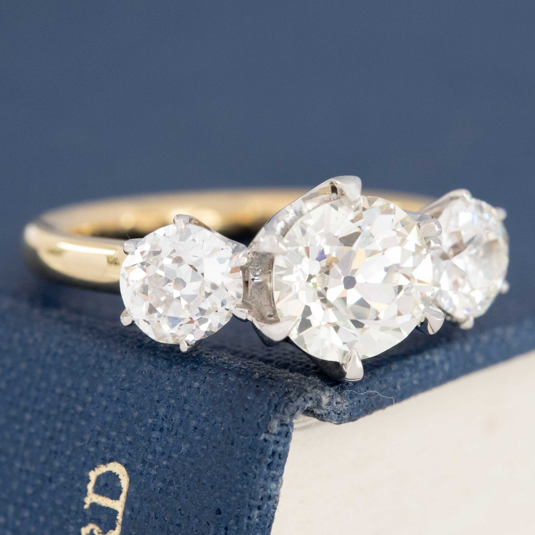 Vintage three-stone ring with antique diamonds