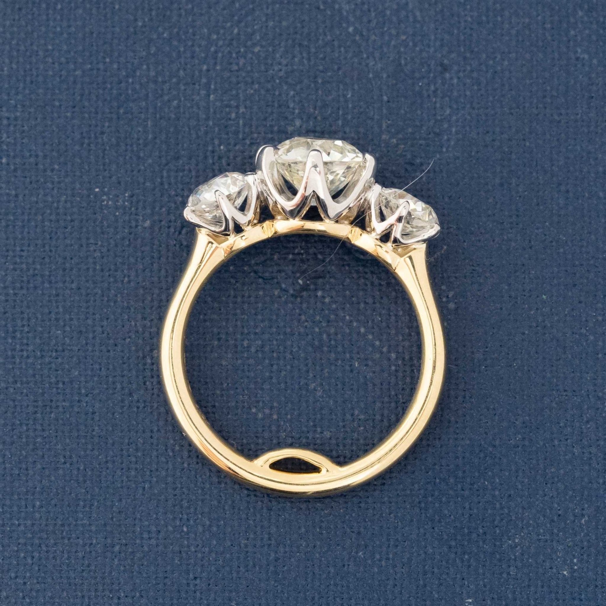 Platinum and yellow gold ring with three antique diamonds
