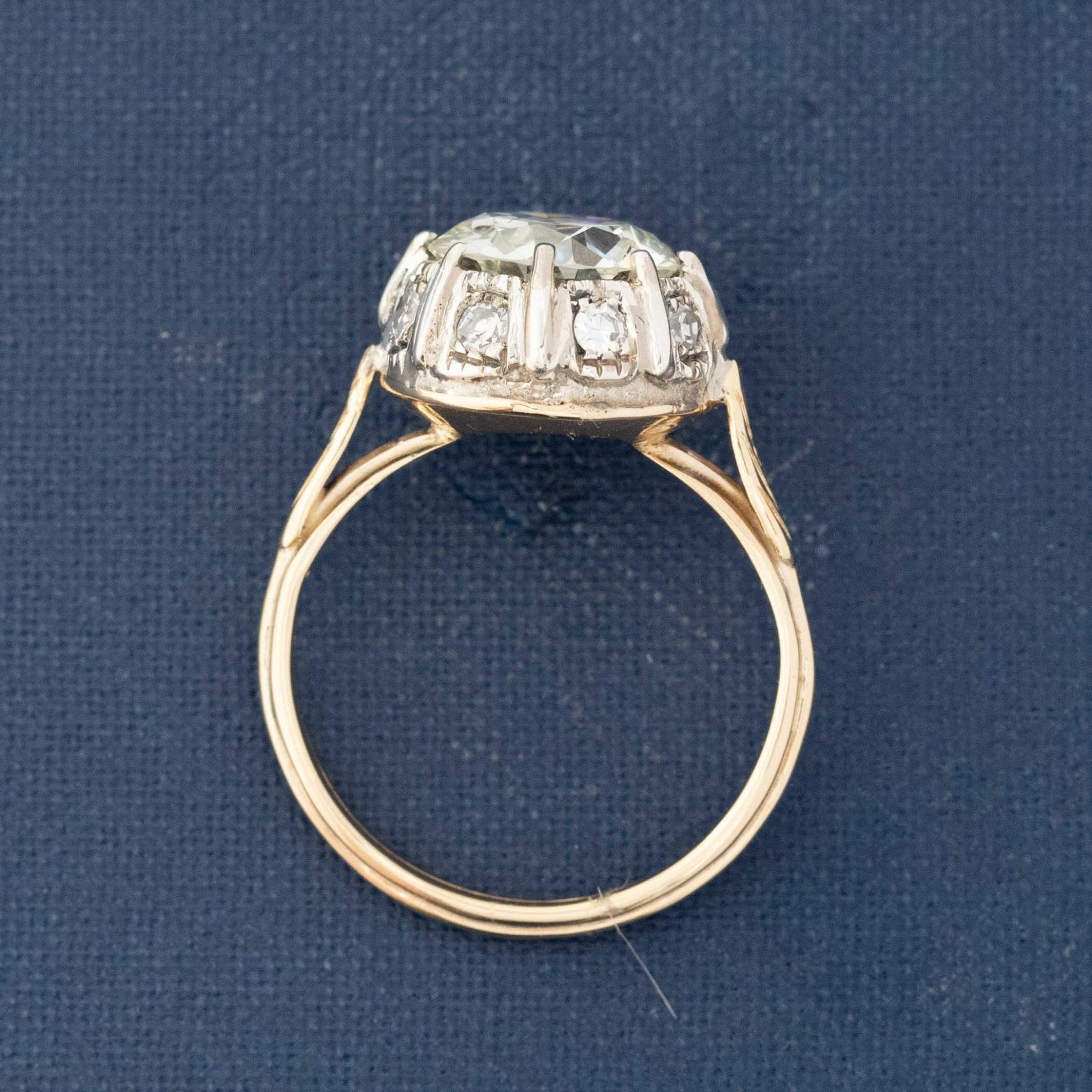 Close-up of antique OEC diamond ring in yellow gold