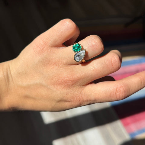 2.97ctw toi et moi ring with a 1.49ct GIA D IF pear cut diamond and 1.48ct Colombian step cut emerald, 18K yellow gold – alternate view 2
