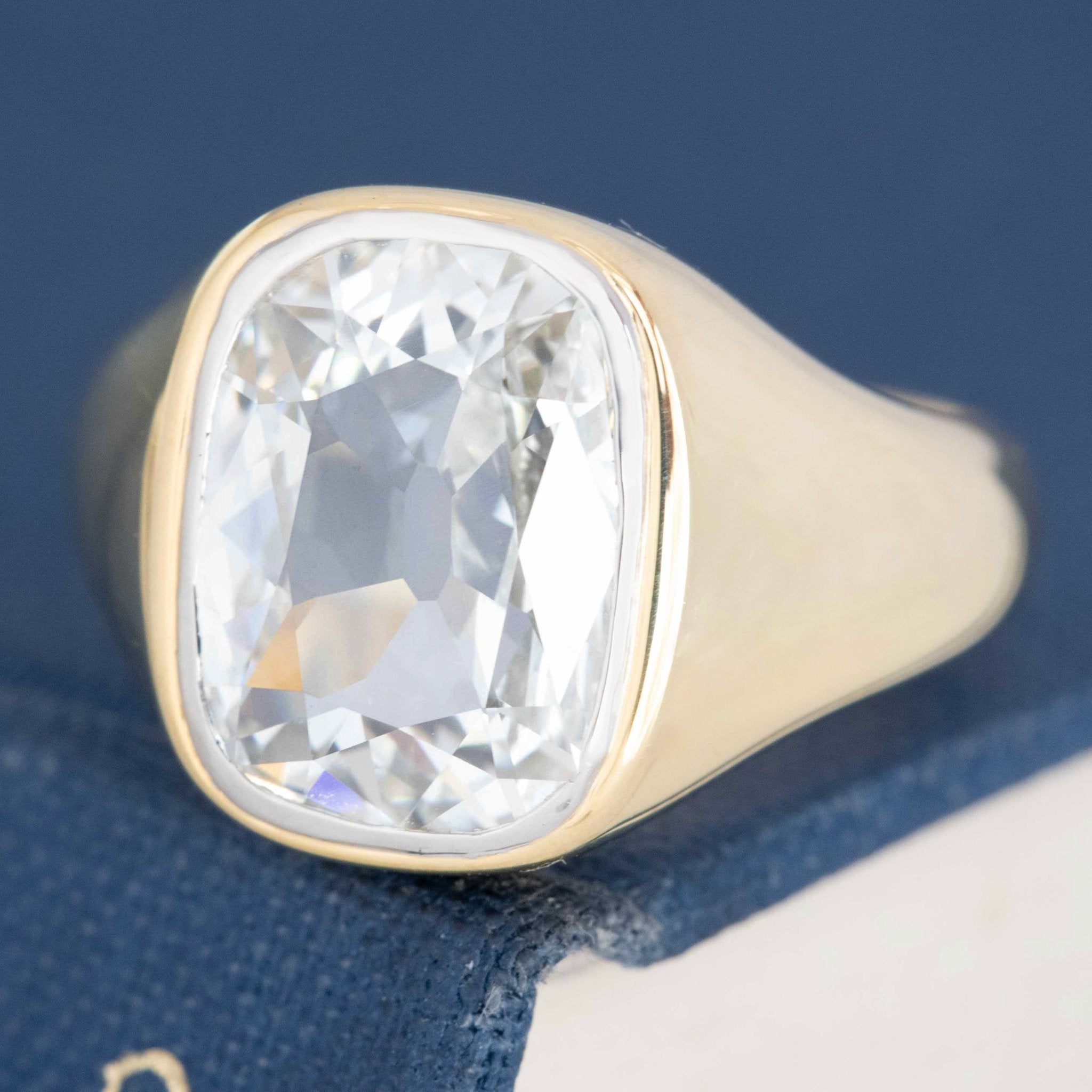 Large antique old mine cut diamond in modern bezel setting