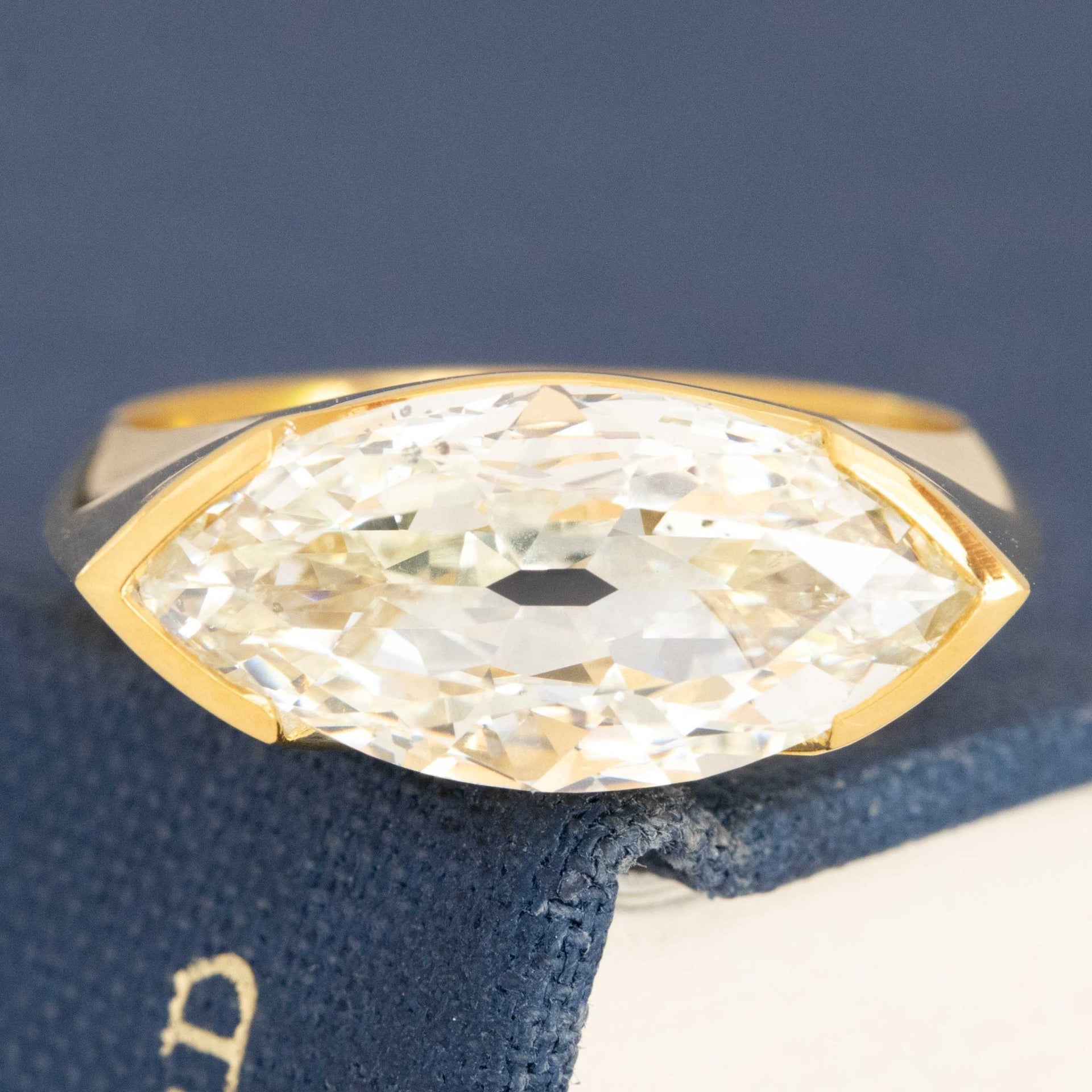 Marquise Cut Diamond Half-Bezel Solitaire