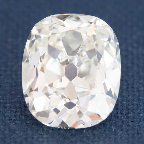 Antique elongated Old Mine Cut diamond with chunky facets

Elongated OMC diamond showing Maltese cross and open culet