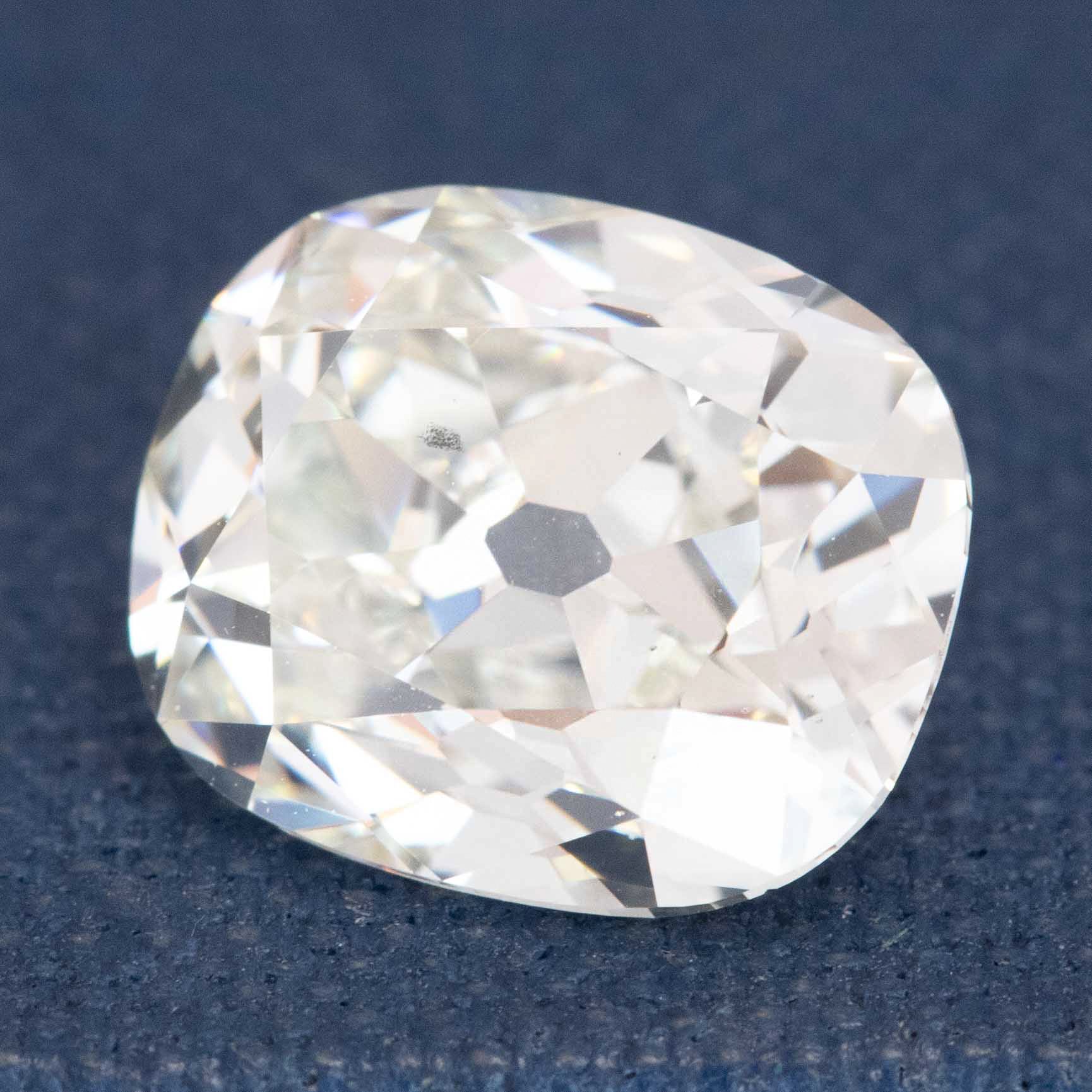 Old Mine Cut elongated diamond with chunky antique faceting