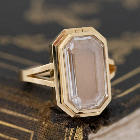 Modern heirloom portrait cut diamond ring with hidden compartment.