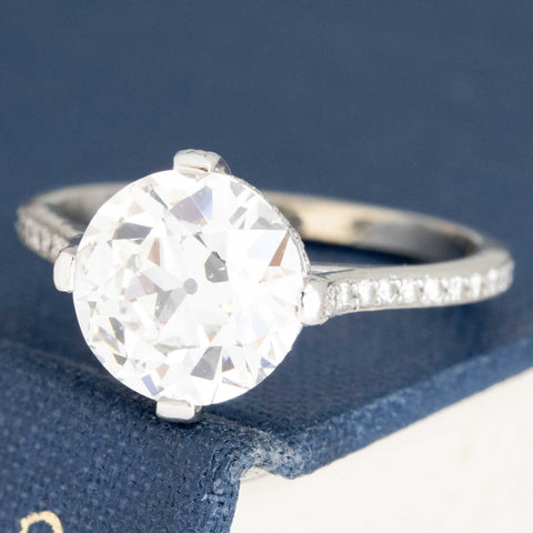 Old European cut diamond ring with sharp contrast zones and white brilliance.