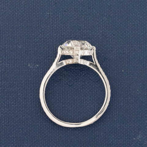 Side profile of GIA certified F SI2 diamond with flower facet pattern.