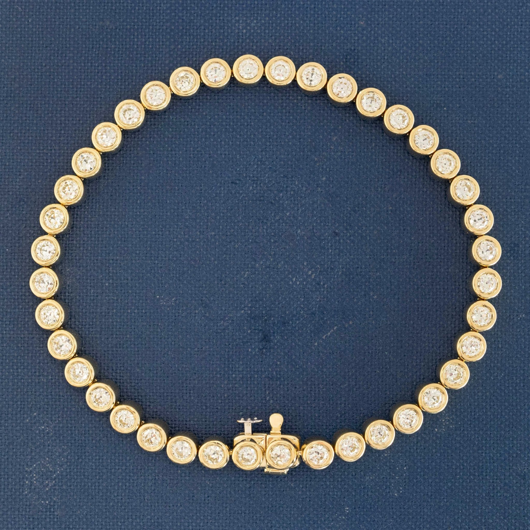 Old European cut diamond tennis bezel bracelet in 18kt gold, 4.4mm width