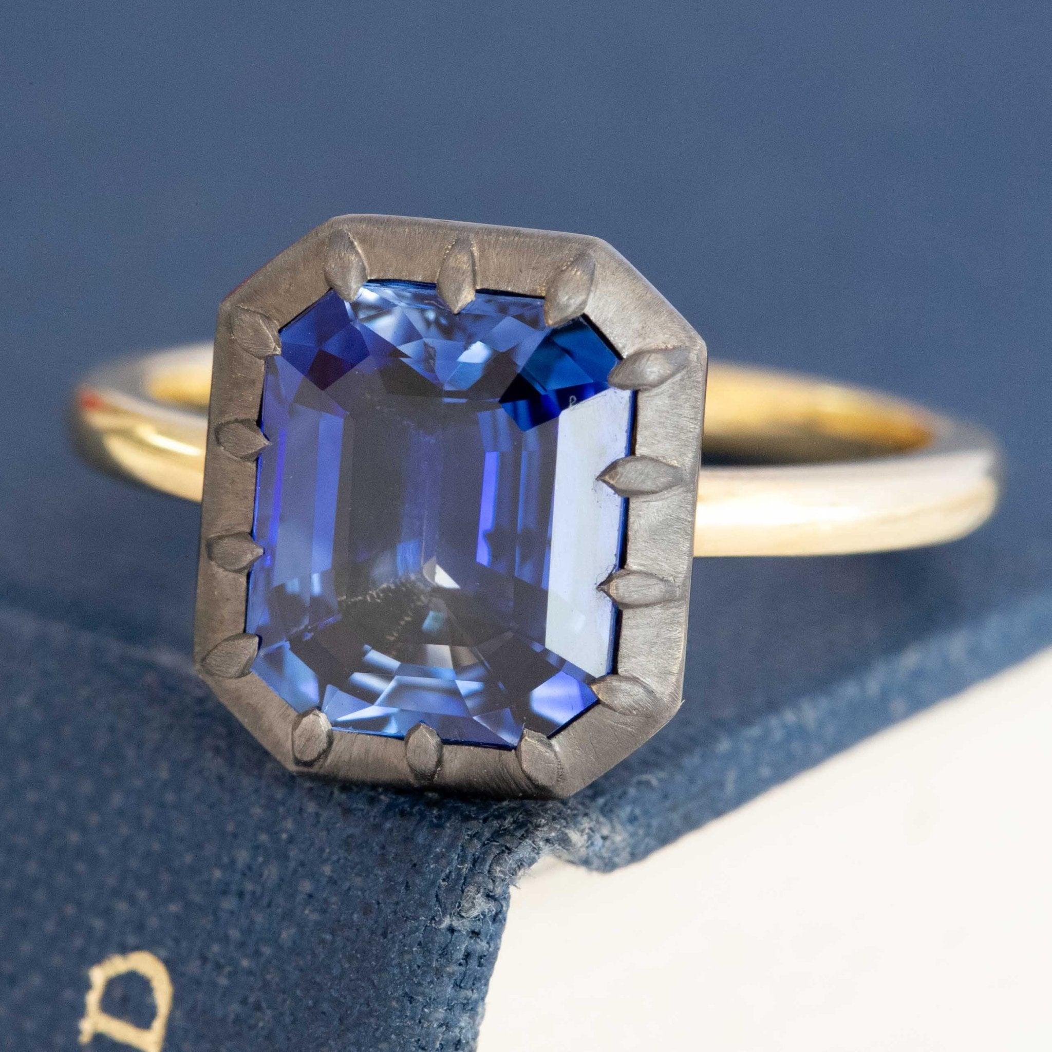 Side view — collet bezel setting vintage style sapphire engagement ring