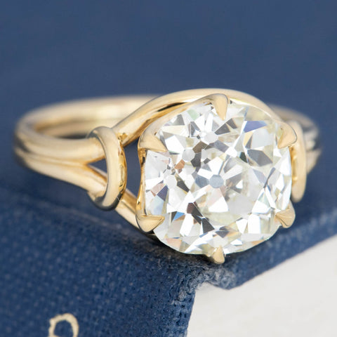 antique old mine cut diamond ring with sculptural gold prongs
