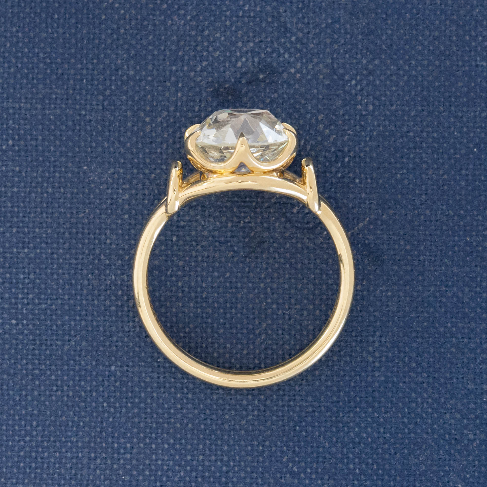 yellow gold diamond ring with organic claw prong setting