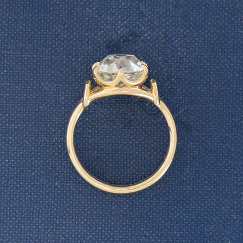 yellow gold diamond ring with organic claw prong setting