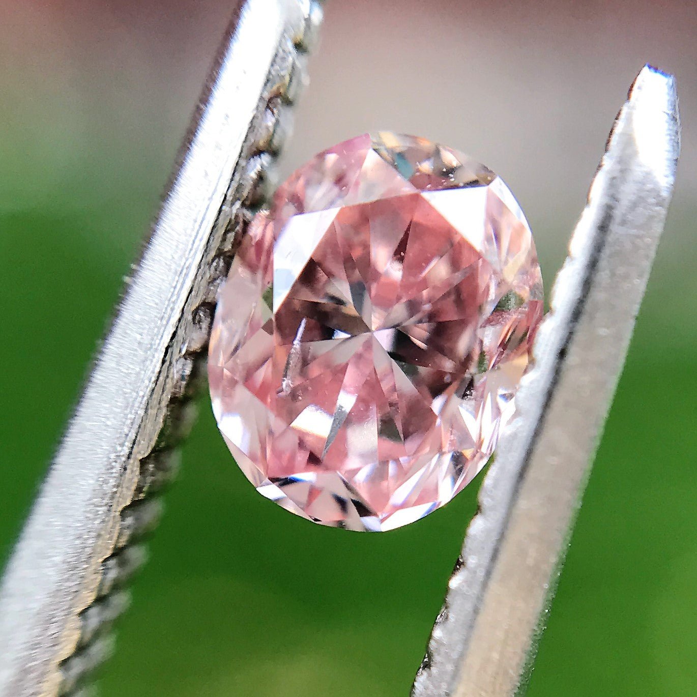 .34ct Fancy Intense Pink Oval Cut Diamond