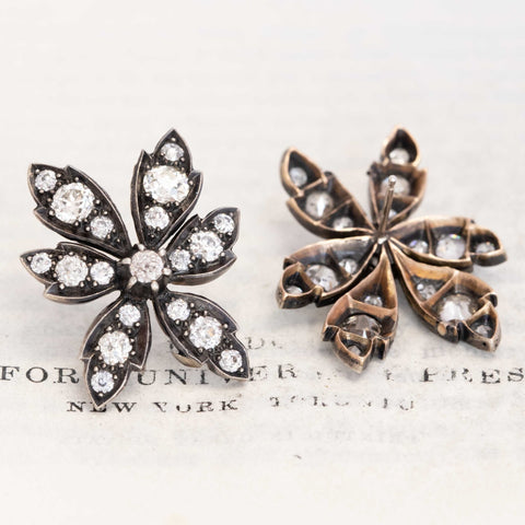 Old-mine cut diamond flower drop earrings close-up