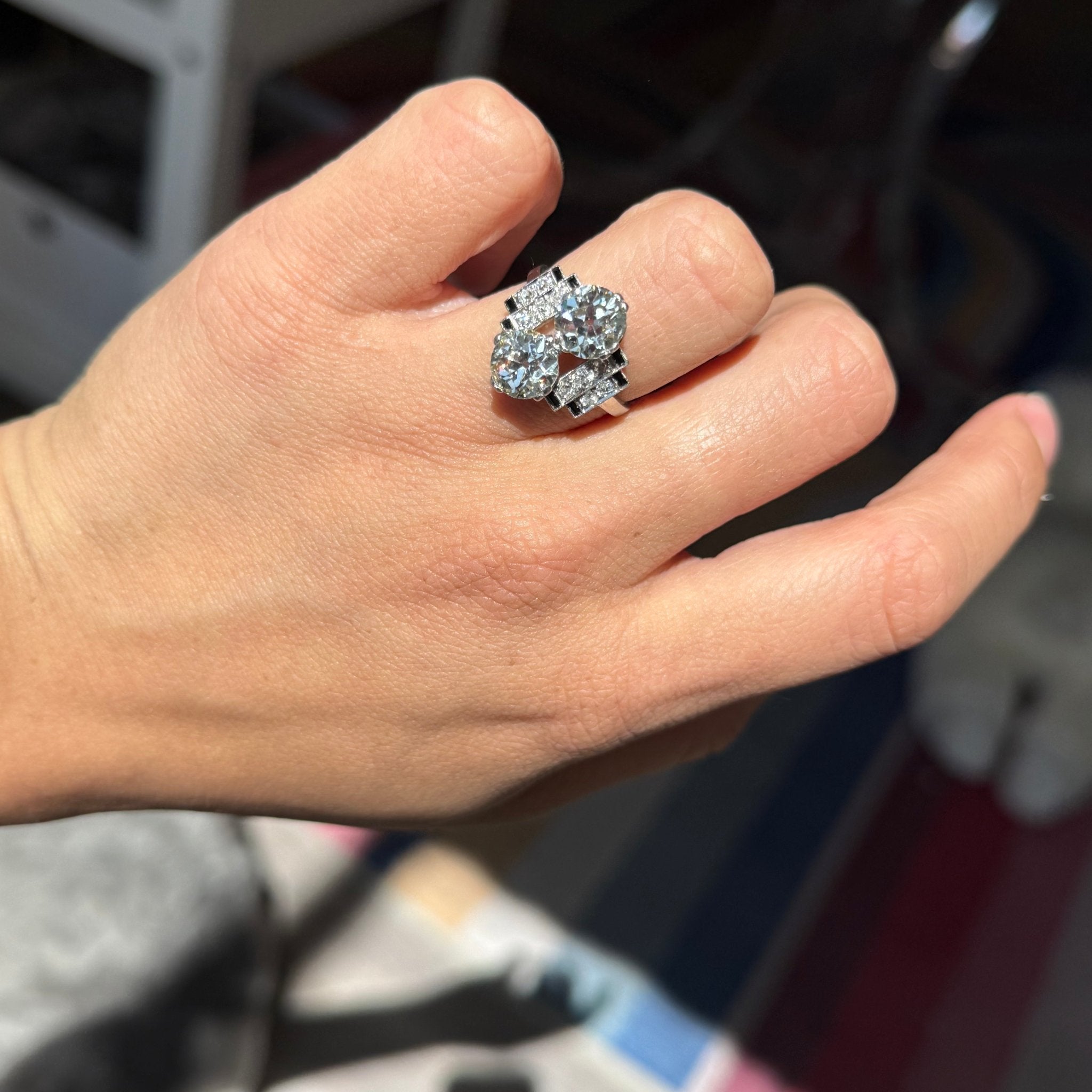 Antique two-stone diamond ring with old-cut diamonds and Deco shoulders