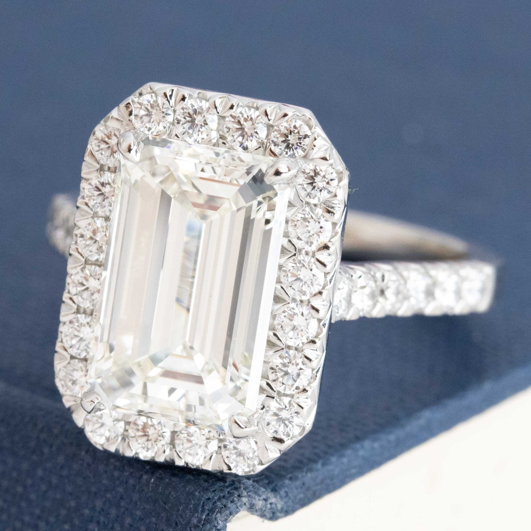 4.01CT EMERALD CUT DIAMOND HALO RING, GIA K VVS2