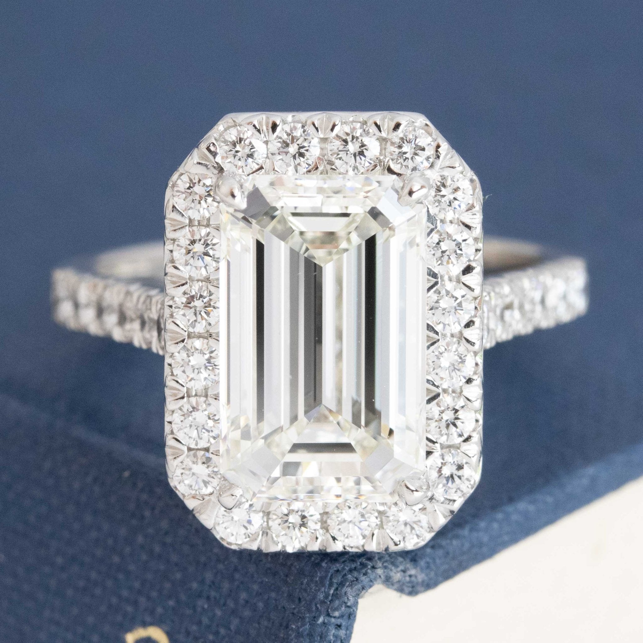 4.01CT EMERALD CUT DIAMOND HALO RING, GIA K VVS2