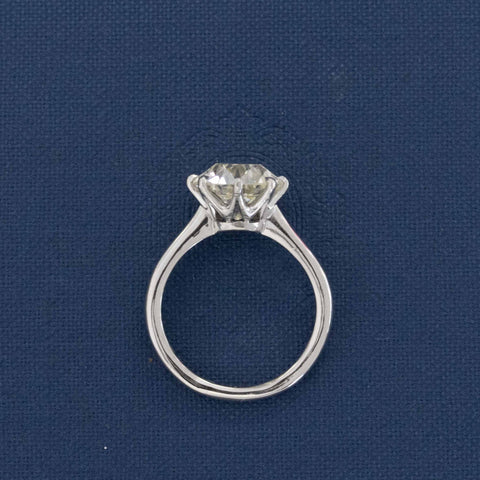 Side view of GIA certified platinum solitaire 4ct Old Euro diamond with bright white face-up.