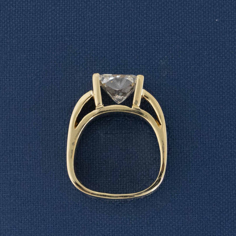 Side profile of vintage-inspired 4ct princess cut diamond ring for collectors.
