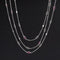 4.40ctw Ruby and Diamond Station Necklace, 56"