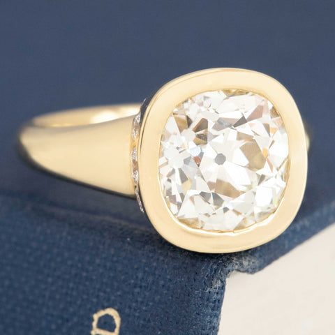 vintage old mine cut diamond with bezel setting and OP VS2 GIA grading

