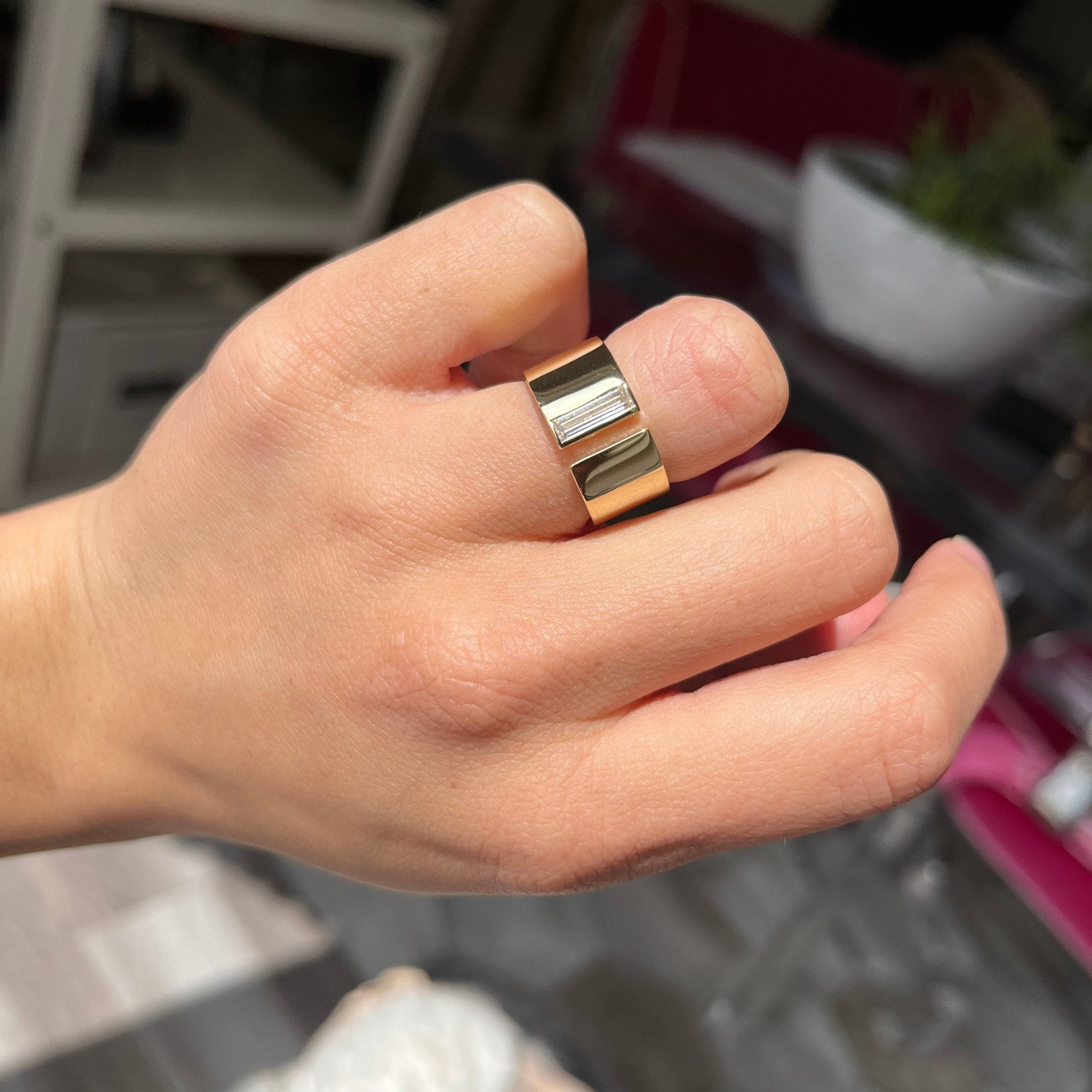 Elegant .45ct Baguette Cut Diamond Cigar Band, romantic design with Baguette Cut Diamonds, Earth-mined diamonds in yellow gold shown on ring finger.