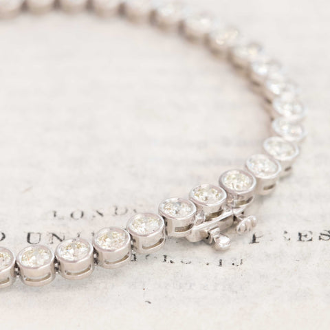 Close-up of antique Old European cut diamonds bezel-set in platinum. 