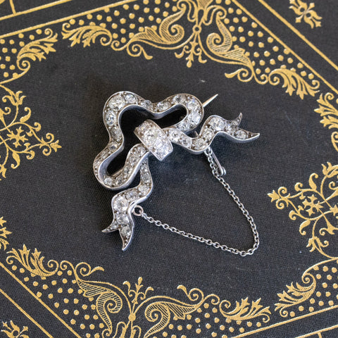 Sentimental Victorian brooch ribbon motif diamonds yellow gold