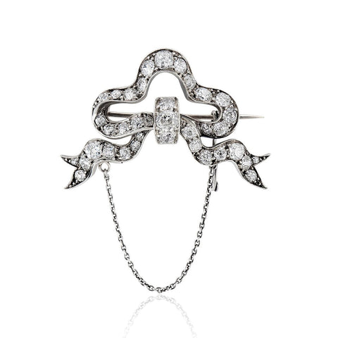 5.20 carat diamond bow brooch side view warm gold tone