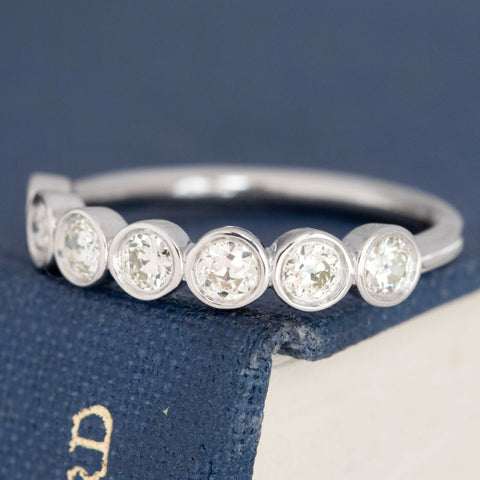 .54ctw Petite Old European Cut Diamond Bezel 7-Stone Band