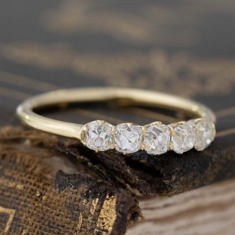 Antique lovers’ .55ctw Petite Old Mine Cut Diamond 5-Stone Band in yellow gold, featuring rare Earth-mined Old Mine Cut Diamonds.