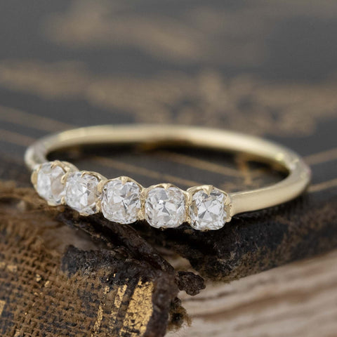 Close-up of .55ctw Petite Old Mine Cut Diamond 5-Stone Band, vintage-inspired band with Old Mine Cut Diamonds, crafted in yellow gold.
