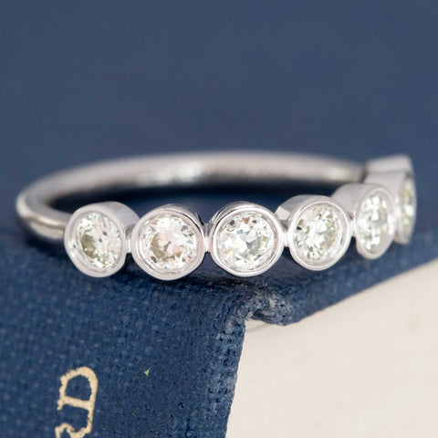 .56ctw Petite Old European Cut Diamond Bezel 7-Stone Band