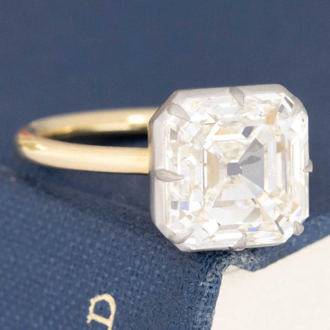 6ct Asscher cut vintage diamond ring, contemporary design.