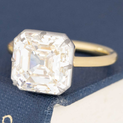Modern Fairfax setting with vintage Asscher cut solitaire diamond.