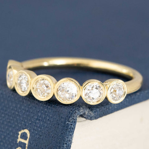 .63ctw Old European Cut Diamond 7-Stone Bezel Band
