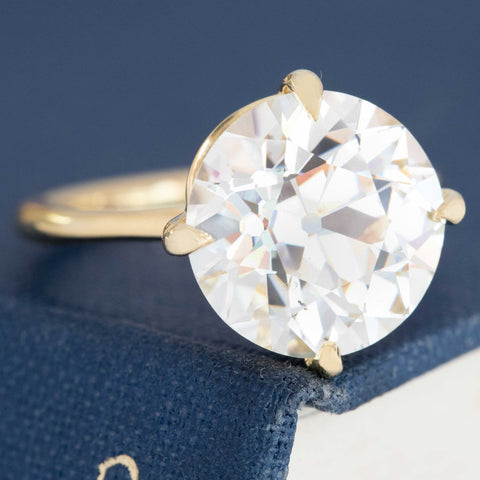 Chunky faceted Old European Cut diamond with open culet.