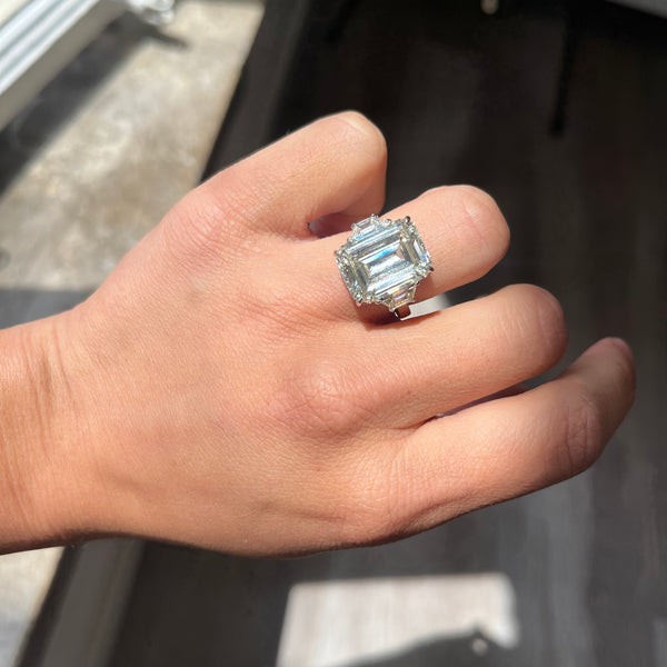 Emerald Cut Diamond Trilogy Ring on finger