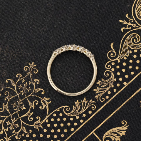 Side view of .69ctw Round Brilliant Cut Diamond 5-Stone Band, vintage-inspired band with Antique Diamonds, crafted in yellow gold