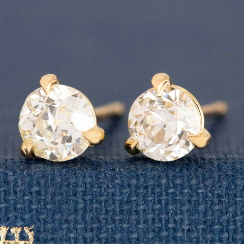 Close-up of vintage diamond studs with old European cuts