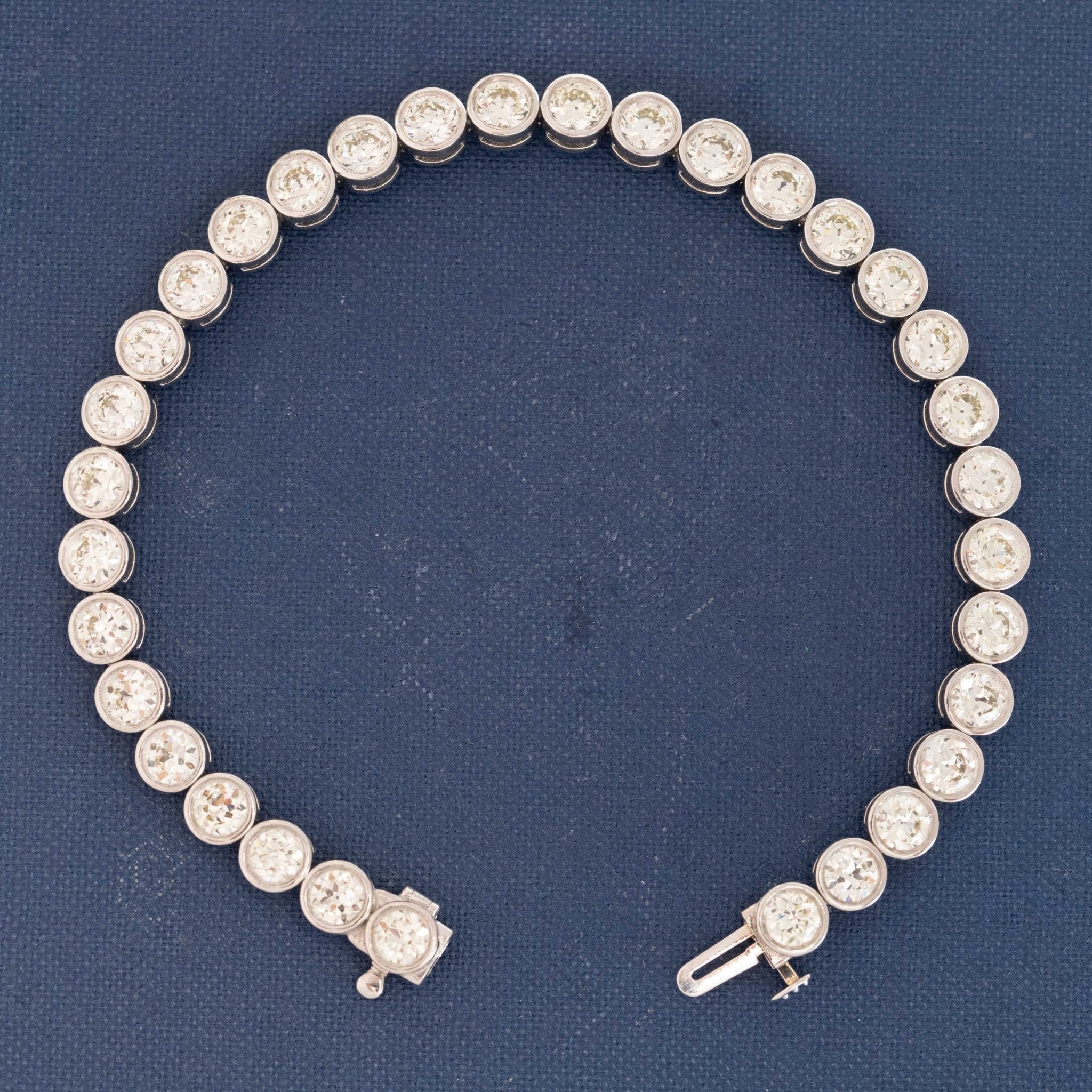 Vintage bezel-set diamond tennis bracelet close-up