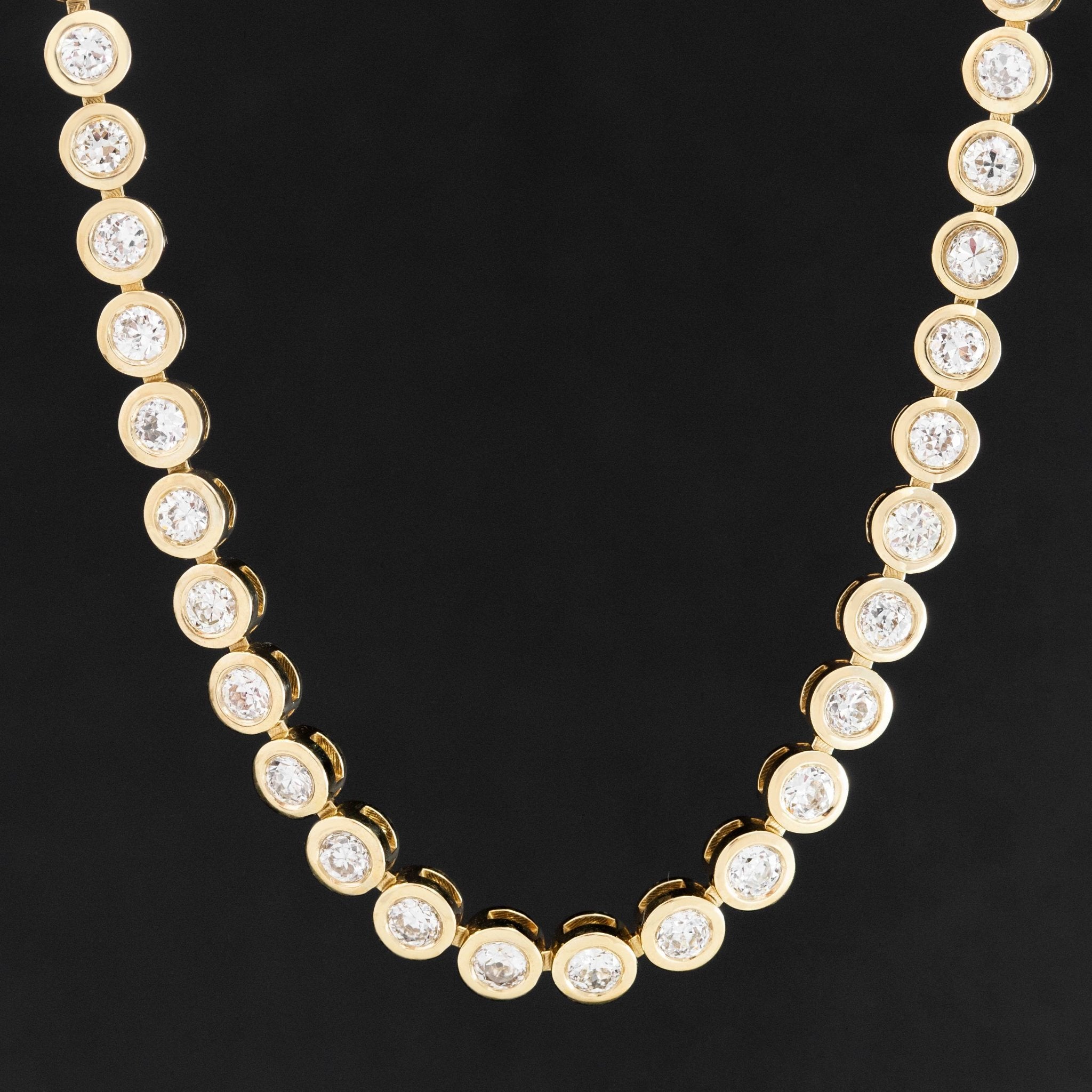 8.56ctw Antique diamond rivière necklace handcrafted in Los Angeles with vintage old-cut diamonds in yellow gold, forming a continuous river of light.