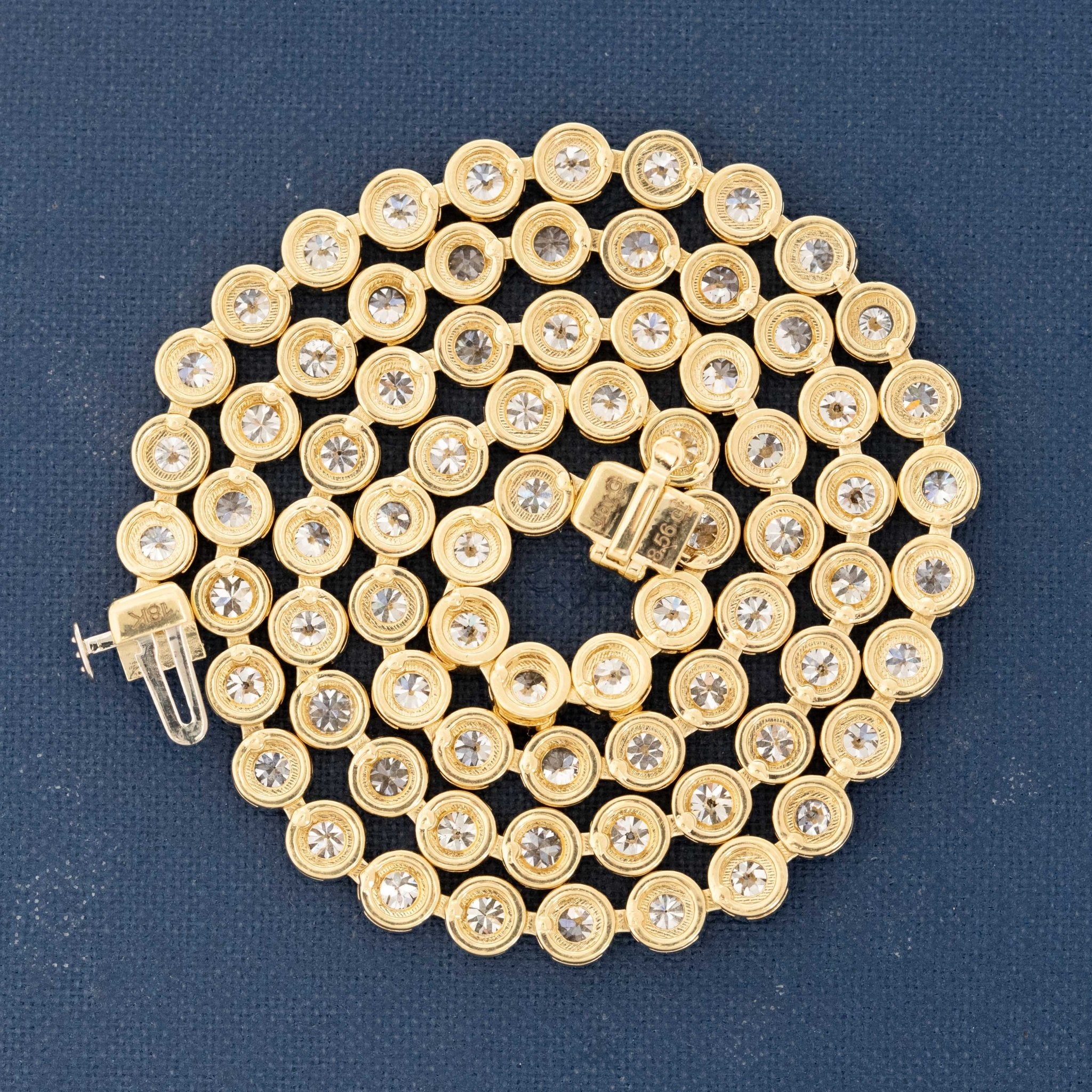 Back of 8.56ctw antique diamond rivière necklace with vintage old-cut diamonds in yellow gold, handcrafted in Los Angeles.